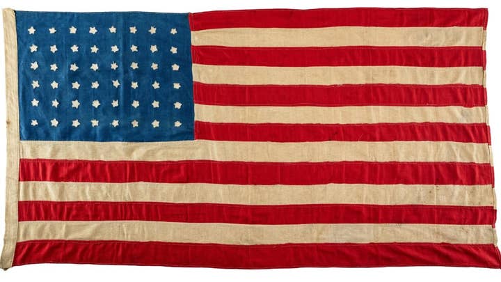 100-year-old US flag made for WWI soldiers returns home