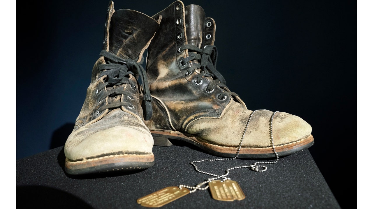 'M*A*S*H' star Alan Alda's boots, dog tags fetch $125K at Dallas auction