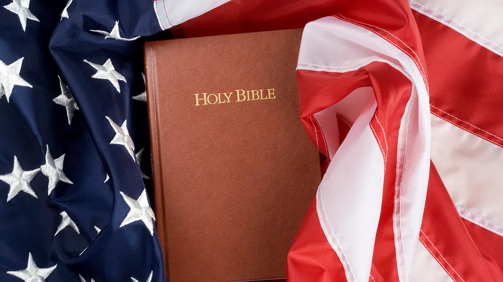 Holy bible in US flag. Close up.