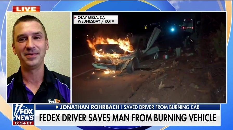 FedEx driver pulls man from burning vehicle during harrowing highway encounter