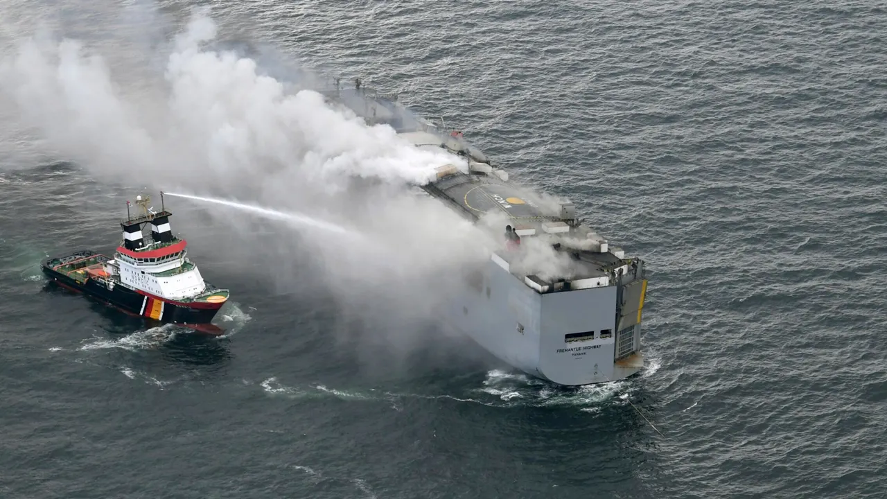 Salvage crews board burning cargo ship off Dutch coast for first time as flames die down