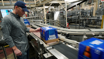 Bud Light layoffs are a push to ‘clean up corporate mess’ and move away from progressive politics, experts say